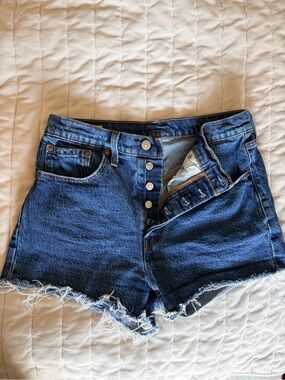 Levi’s 501 Distressed Denim Shorts in Dark Blue